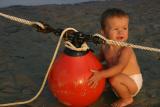 A boy and a buoy. Brewster, Aug. 28, 2004.