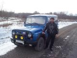 My Driver Anatoli with our new YA3 (UAZ), somewhere in the Far East 1999