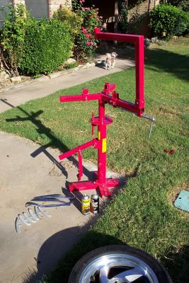 Harbor freight tire changer stand (model 34542) and motorcyle adapter (model 42927), motion pro tire iron, and rim savers
