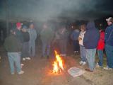AS THE NIGHTTIME TEMPERATURE DROPPED, GATHERING AT THE FIRE FOR CONVERSATION WAS THE THING TO DO