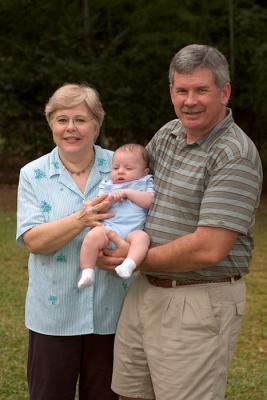 Grandma, Grandpa, and Thomas outside 2