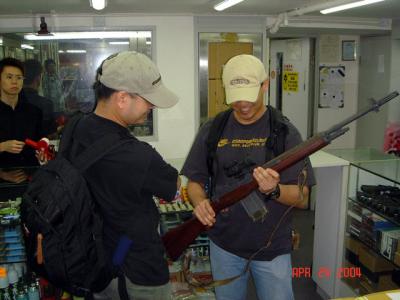 One-Zero and Flik holding the Airsoft Club M-14 at Guns N' Guys