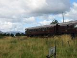 Level crossing with a surprise view of Royal Scotsman.JPG