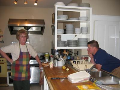 Carl bugging the cook - let her cook so we can eat!!!!!