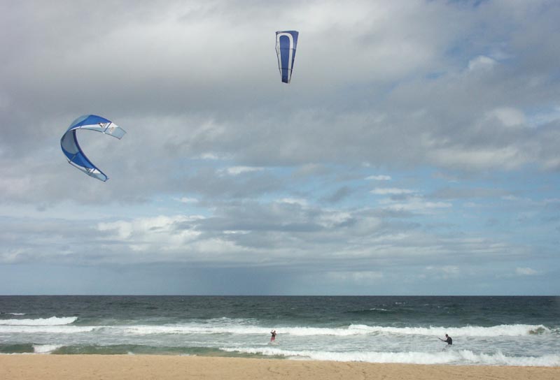 Two kite surfers