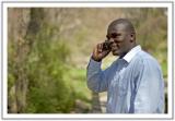 man on cellular, green