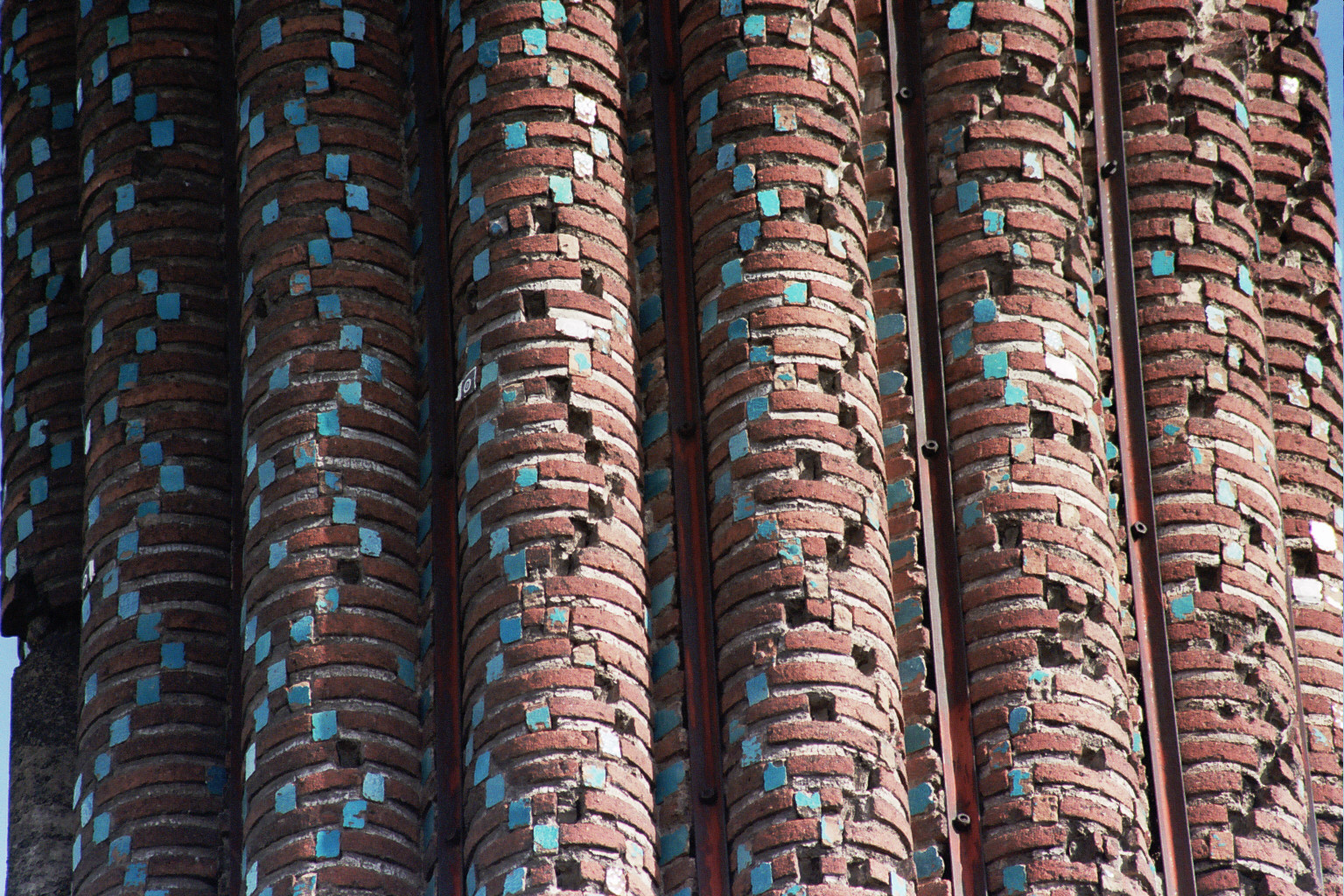 Close-up of minaret with turquoise