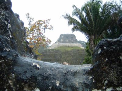 Xunantunich Buildings A-1 and A-6-el Castillo from A-13 window opening.