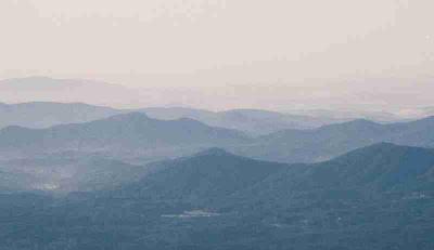This looks best here in Medium view.  An early morning shot across the mountains to the west, from atop Mount Mitchell in western North Carolina - the highest peak east of the Mississippi River.