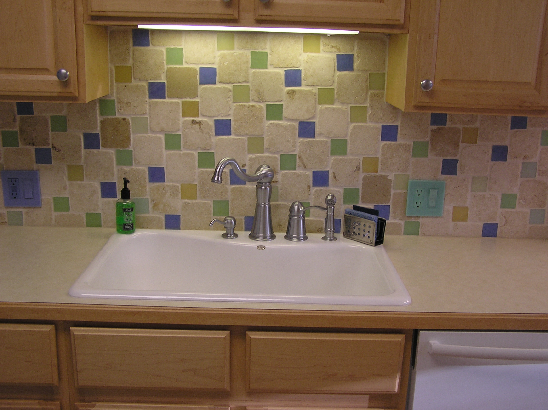 The sink, with a digital camera.