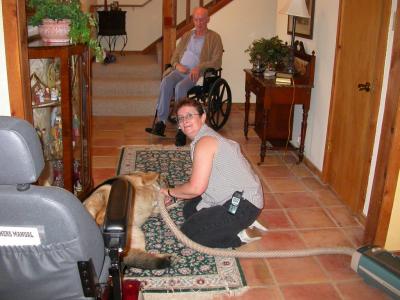 John with Pam vacuuming Sam