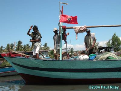 Fishing boat going out to sea