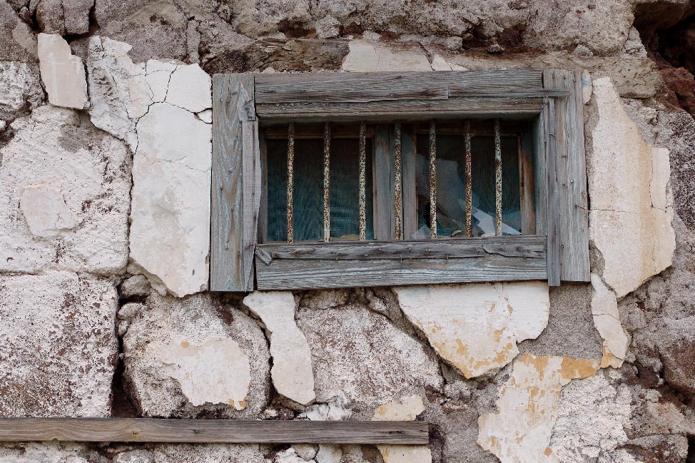 Old window in rough stone wall