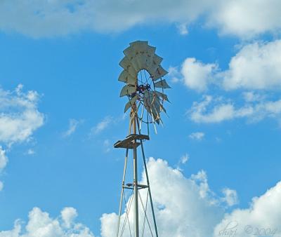 windmill with clouds