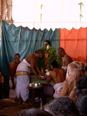 Sarathi adorning tulasi garland
