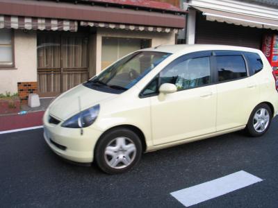 Cream Colored Honda Fit, Narita 2004