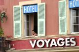 Man-in-Hotel-Window-Nice, France