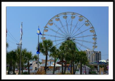 The Family Kingdom Ferris Wheel in the center Pavilion area of Myrtle Beach, just alongside Ocean Boulvard in the center of town.