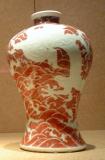 Orange and white dragon vase