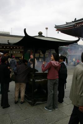 
Locals outside the shrine