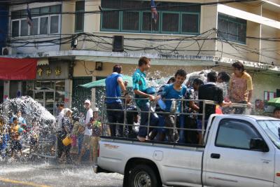 Thai New Years!! No one is excempt from Water and rice flower