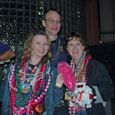 The Toga Krewe attends the Bacchus Parade