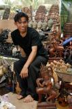 Vendor of wood carvings at Angkor Wat