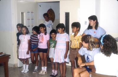 Children of the Home Sing for Guests