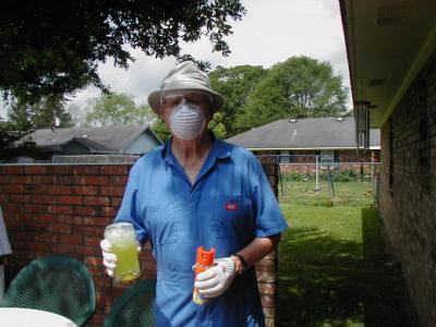 My Daddy working in his yard   04-26-04