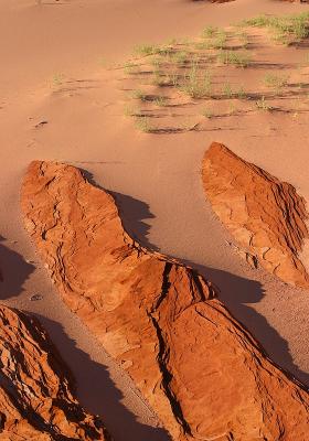 Rock, sand, and grass