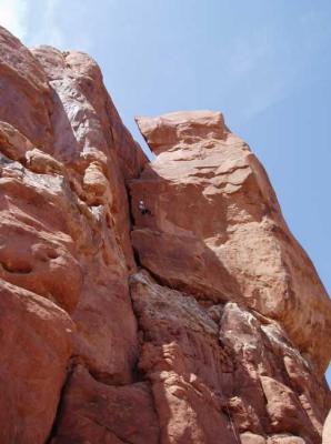 Martina abseiling after climbing Off-Balance Rock in Arches National Park 