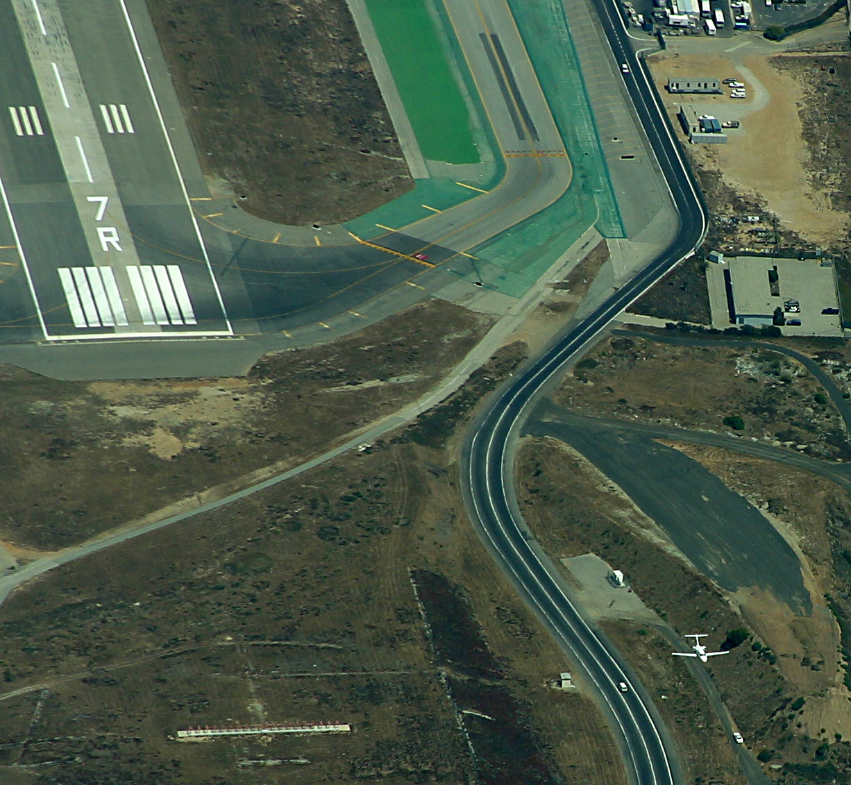 Passing the end of a runway. Note the small jet below me and to the right.