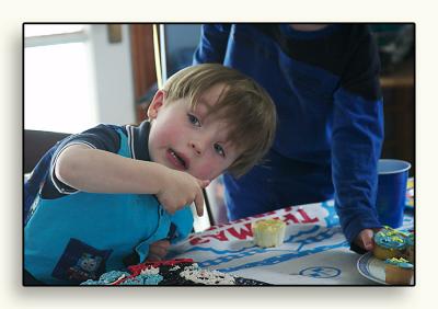 Birthday Boy checks out the cake!