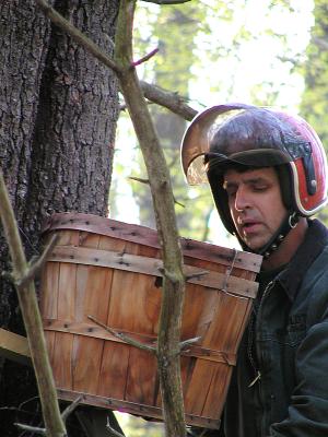 Don, a volunteer at the Feather, goes up first. Outfitted in protective head gear in case mom decides to attack. And yes, he confirms there is a baby and another egg!