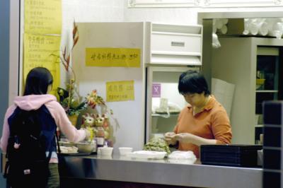 This vendor guarded her  recipe for her special  choy yook wonton like a hawk!