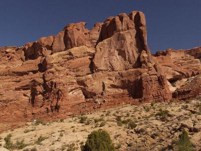 Note the car, left bottom of cliff