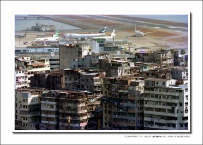 Kai Tak Airport surrounded by the old apartements