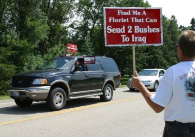 Guys in the SUV are Pro Bush.jpg