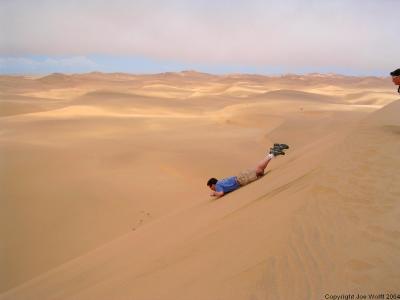 The real fun begins, sledding down the dunes