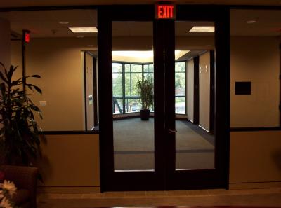 This is the view I see when sitting behind my desk.  Outside my office doors is a bank of 4 elevators; 2 on each side.