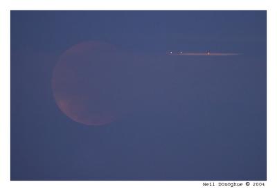 Plane with Moon during Lunar Eclipse