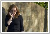 woman on cell receiving amazing news