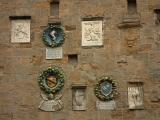 Emblems on Palazzo del Priori, Volterra