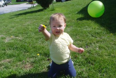 Reagan giving mommy a flower