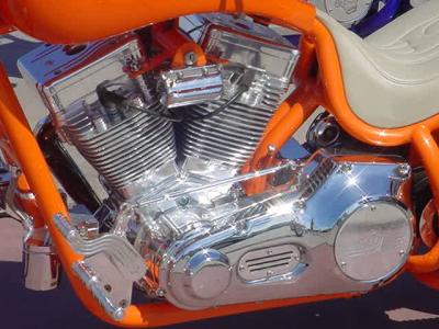 beautiful orange bike  and custom chrome motor
