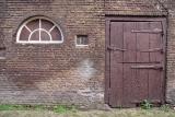 Brown door in old farm