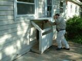 Taking apart the dog door house