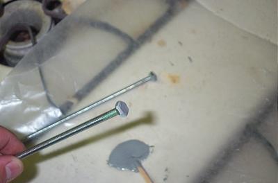 Nut is JB Welded on one end of the threaded rod as an anchor