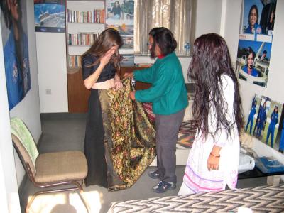 And, the girls give her a sari