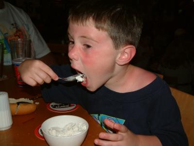 Zachary enjoys some ice cream....
